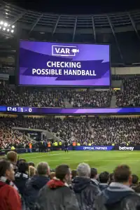 The Handball Law - VAR screen checking for a handball